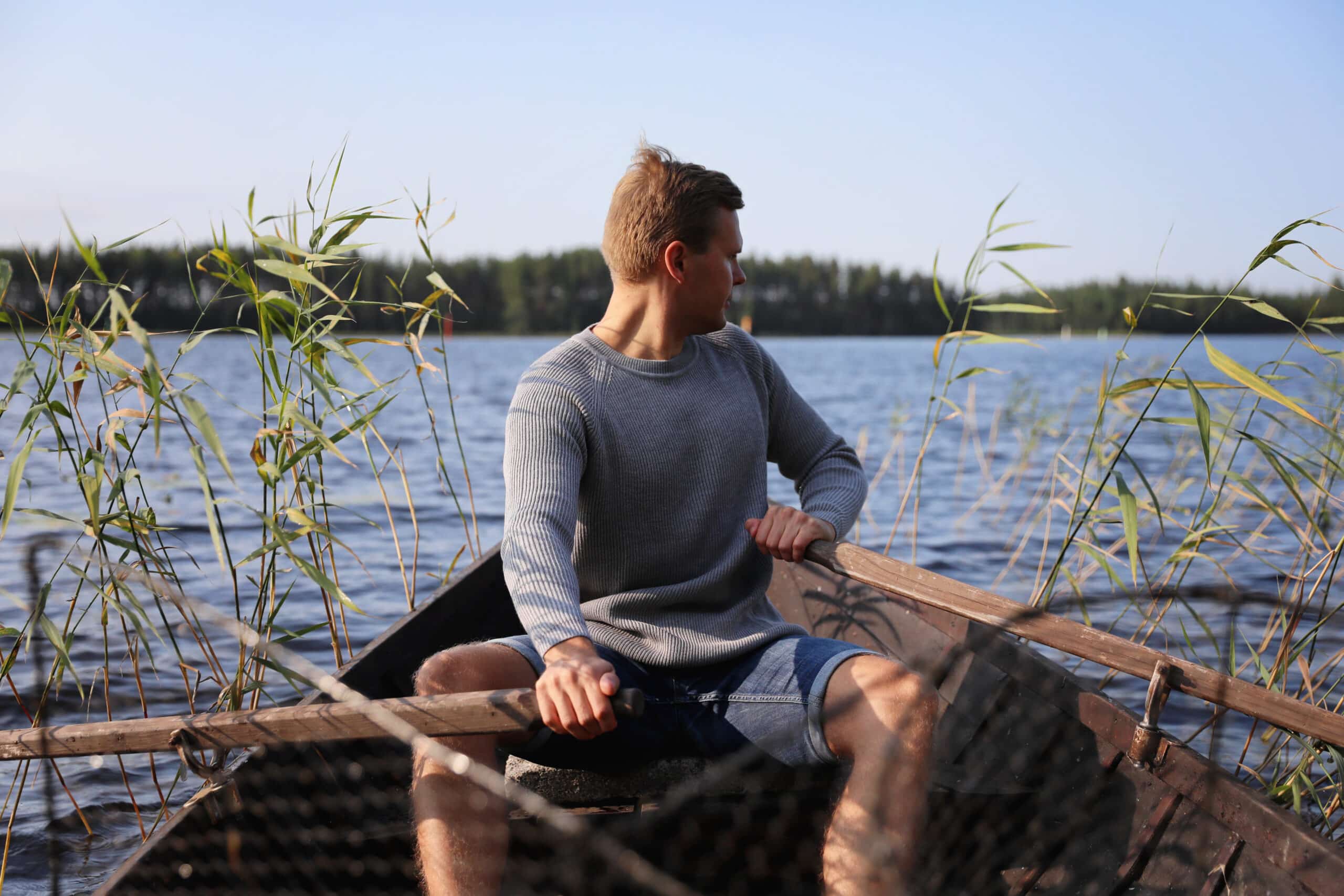 man in rowingboat in Finland