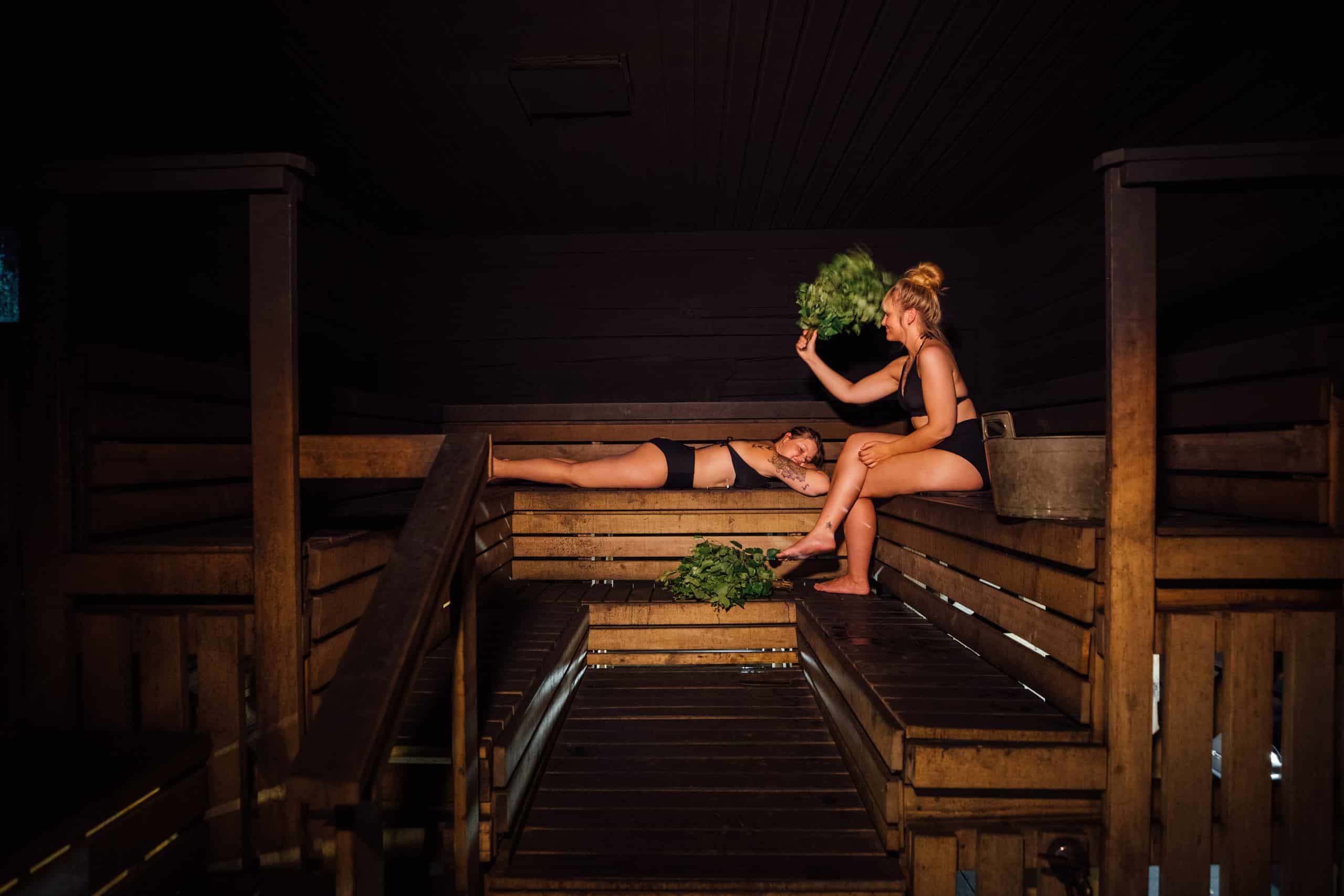 Two persons in a sauna